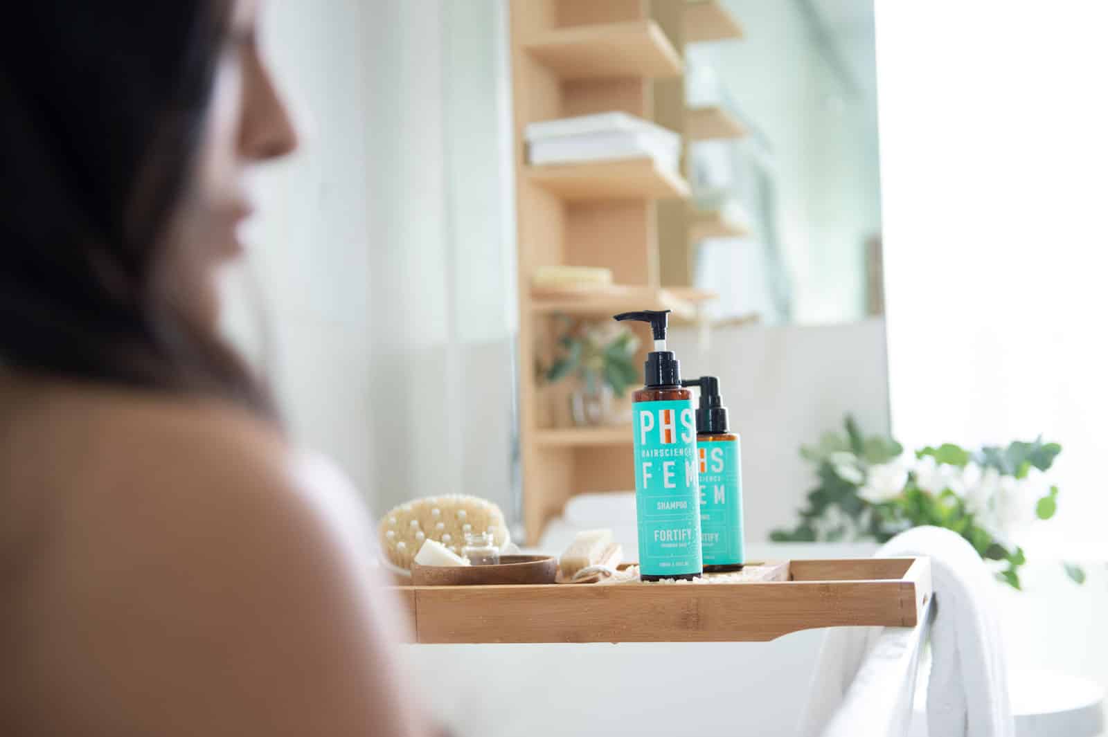 FEM Fortify Shampoo products in bathroom for hair loss