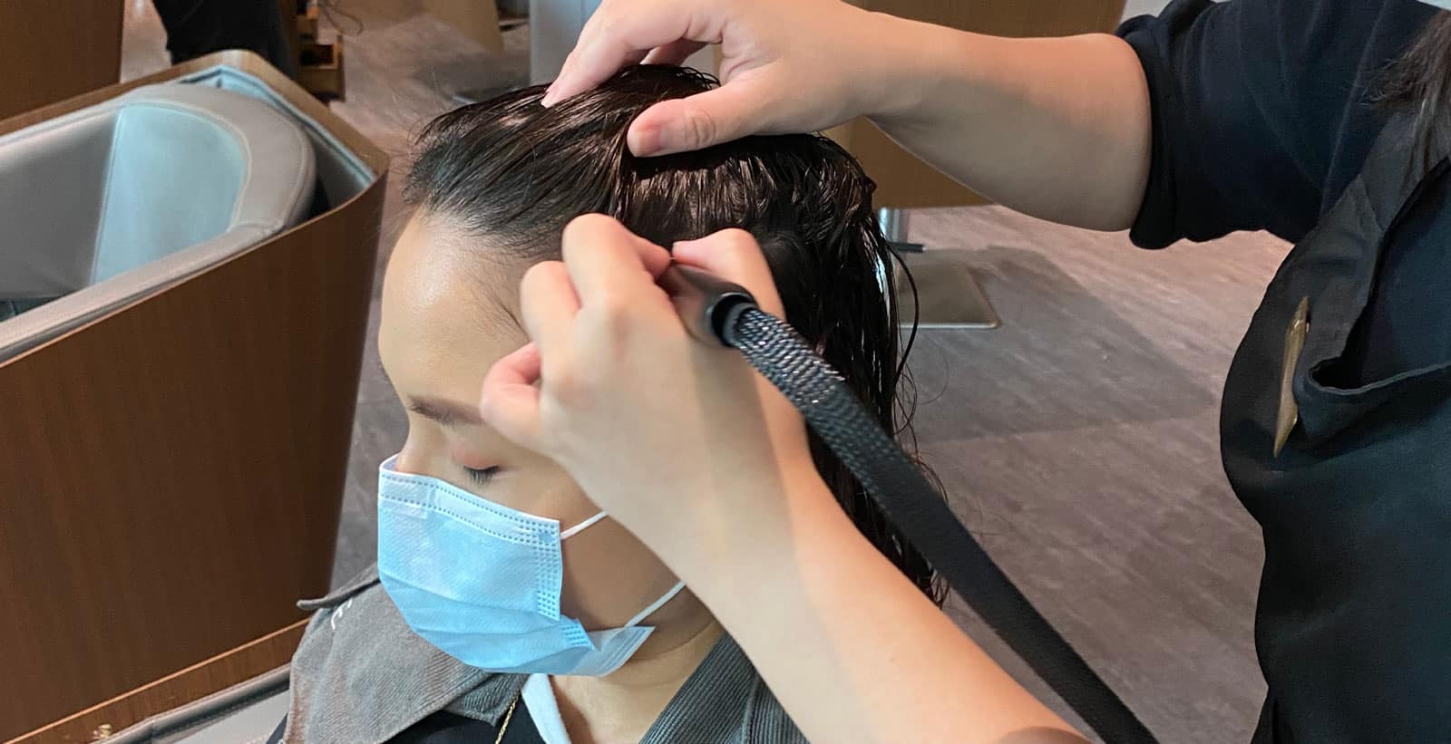 woman-having-scalp-treatment-at-phs-hairscience-outlet